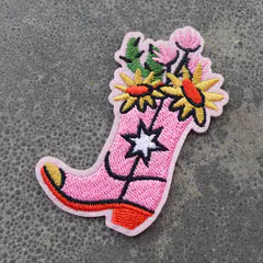 Het geborduurde embleem Cowboylaarsje