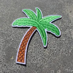 Het geborduurde embleem Palmboom
