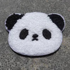 Het geborduurde embleem Panda